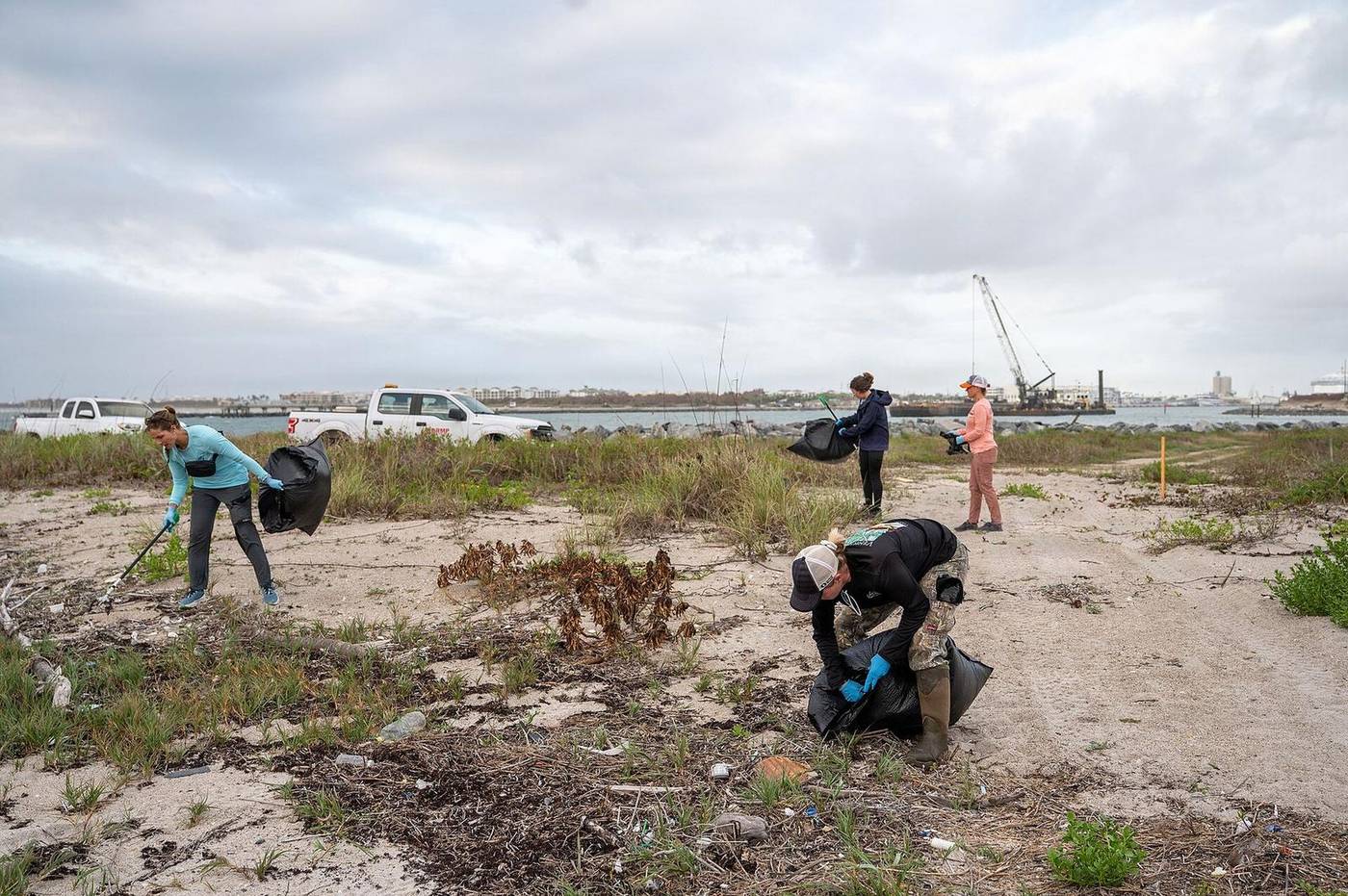 Beach cleanup volunteers at Cape Canaveral shoreline